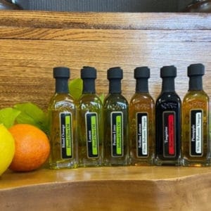 OV Harvest citrus sampler featuring Blood Orange Olive Oil, Eureka Lemon Olive Oil, Persian Lime Olive Oil, Tangerine Balsamic, Pineapple Balsamic & Sicilian Lemon Balsamic