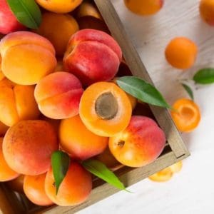 photo of apricots in wooden crate representing Blenheim Apricot White Balsamic