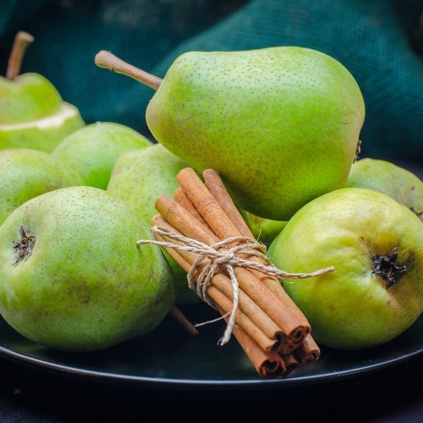 photo of pears and cinnamon sticks representing cinnamon pear balsamic vinegar