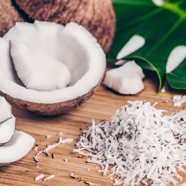 photo of coconuts and coconut shavings representing coconut white balsamic vinegar